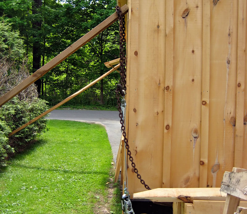 Bracing to correct plumb