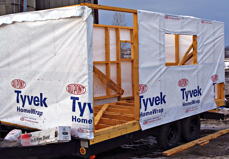 Tyvek house-wrap being applied